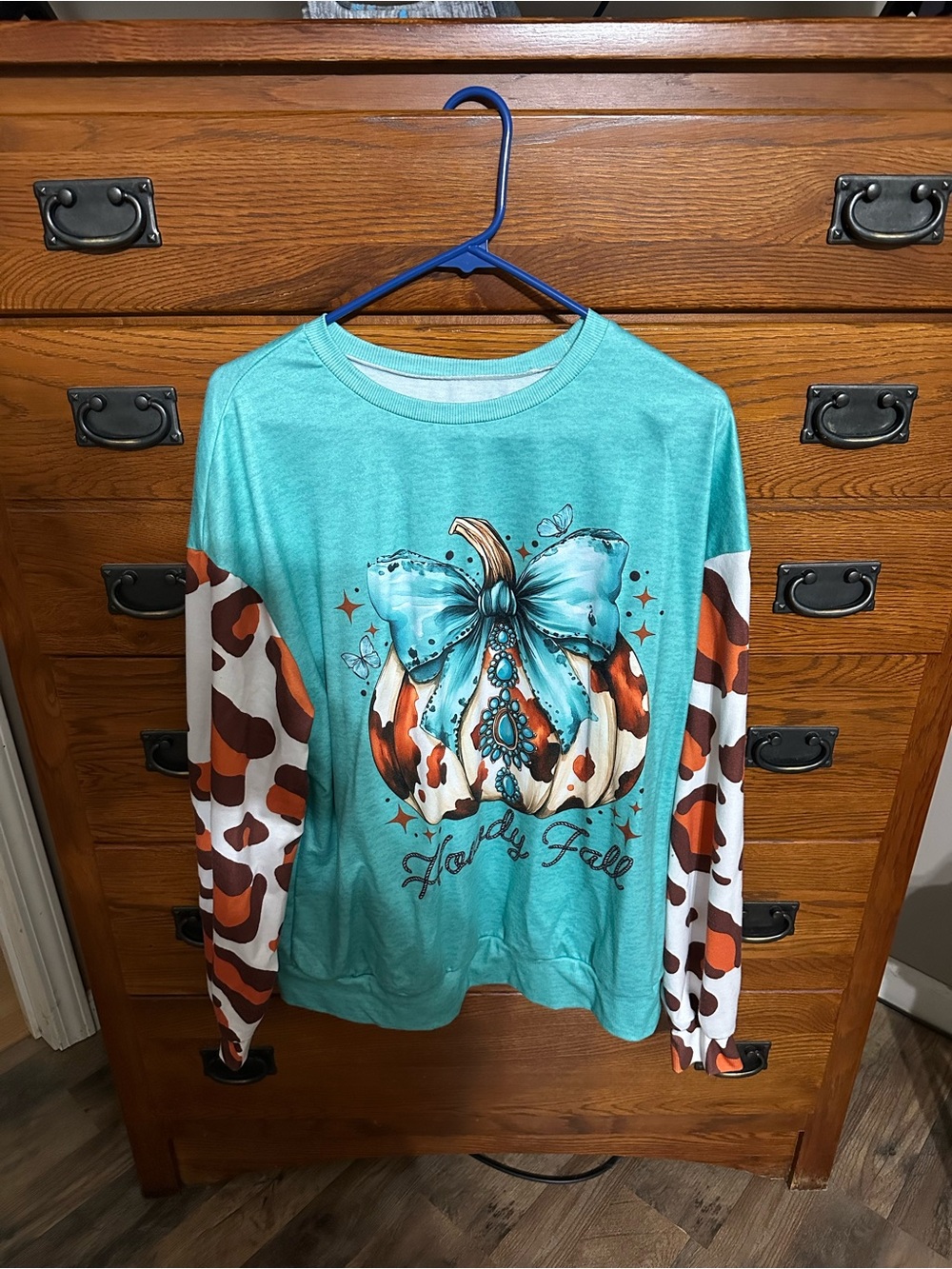 Turquoise Long-Sleeve Pumpkin Graphic Tee with Patterned Sleeves
